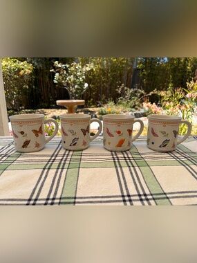 Vintage set of butterfly floral mugs